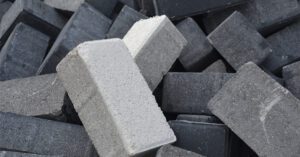 Bricks of concrete, which can be made stronger with recycled PPE