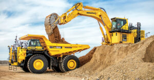 A Komatsu PC 2000 Mining Excavator loading a Komatsu HD1500-8EO Mechanical Haul Truck