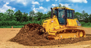 A Komatsu D61PX moving dirt