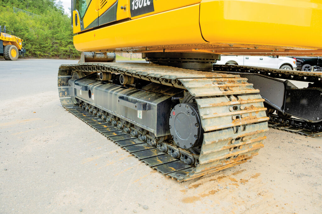 A close up of Komatsu’s PC130LC-11 excavator's undercarriage