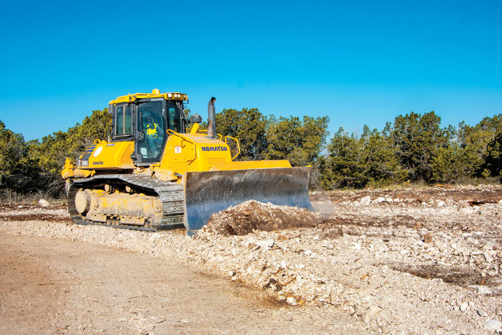 A Komatsu D71PXi owned by Gage & Cade Construction LLC is operated at a job site