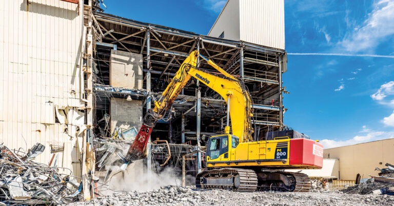 Ascendent Demolition LLC's Komatsu PC800LC demolishes a building