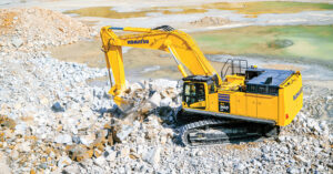 A Komatsu PC900LC-11 Excavator moves rock